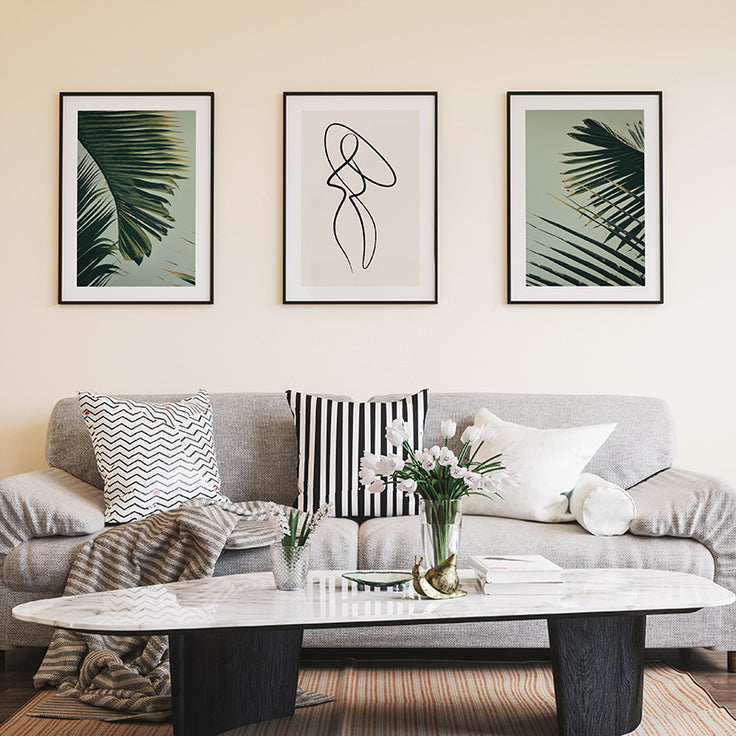 Stilvolle Palme Blätter Galerie Wand in einem schönen Wohnzimmer